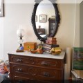 F38. Marble top Victorian dresser with 3 drawers and carved fruit pulls. 